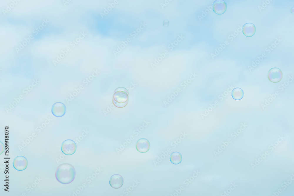 Beautiful soap bubbles on sky background Beautiful soap bubbles on sky background
