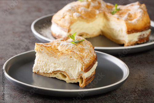Fototapeta Naklejka Na Ścianę i Meble -  Authentic Polish Carpathian Cake Karpatka closeup on the plate on the table. Horizontal