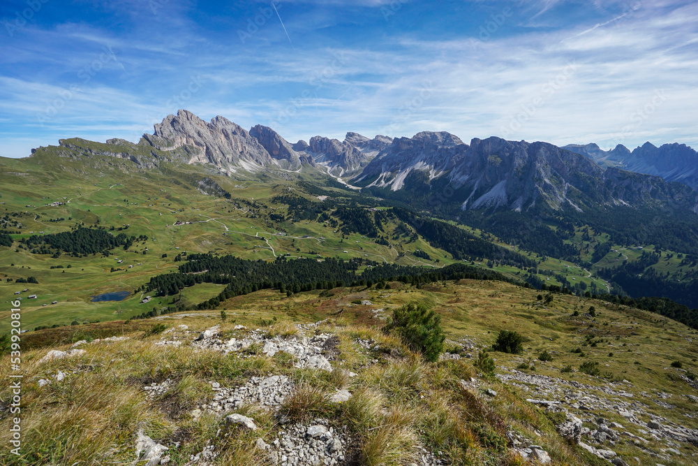 Stunning panoramic view over mastle alp and puez odles nature park. View to seceda and odles peaks and fermeda. Wonderful place for hiking. Holiday and outdoor concept.