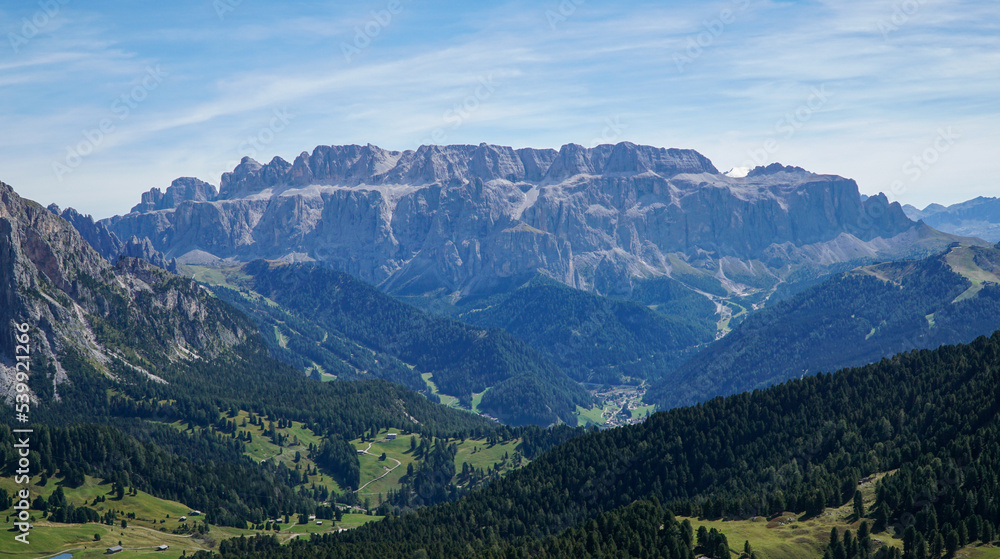 Panoramic view: Amazing view to distinctive mountain Sella Group in the Dolomites: Distinctive and famous mountain ridge in south tyrol, gardena valley, italy. Travel and holiday concept.