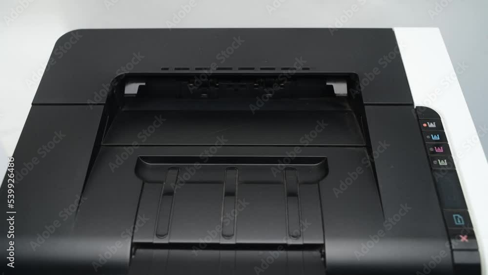 Printer outputs sheet with the word Love Printer outputs sheet with the word Love