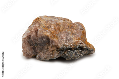 The mineral andalusite is brownish in color with white veins