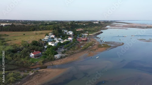 Lake Shore Hotel And Restaurants Along The Ria Formosa Lagoon With Cacela Velha Beach In Portugal. - aerial