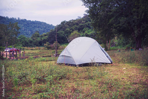 Travelling concept.tent in the mountains.Camping tent in forest