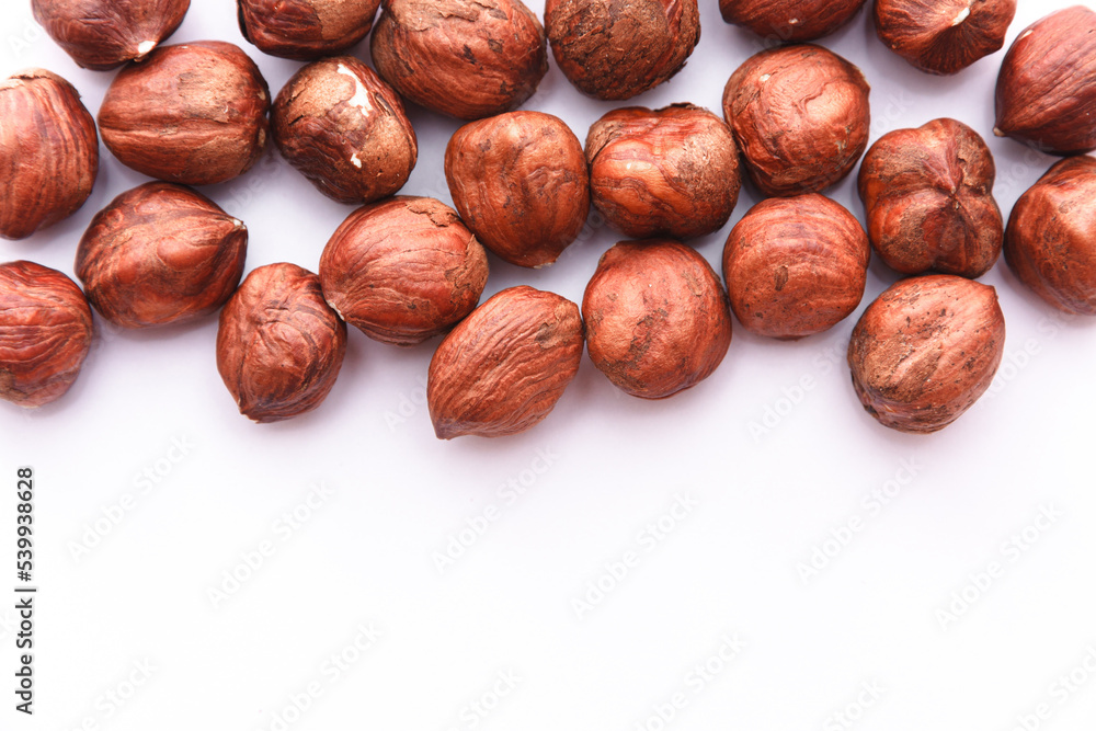 Hazelnuts isolated on white background. Top view. Flatlay Hazelnuts isolated on white background. Top view. Flatlay