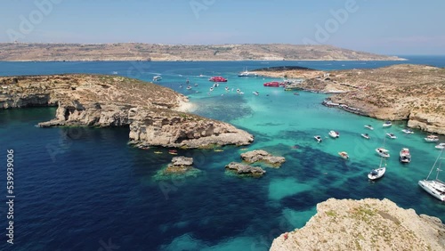 Aerial view flying over yachts in Blue Lagoon, Malta photo