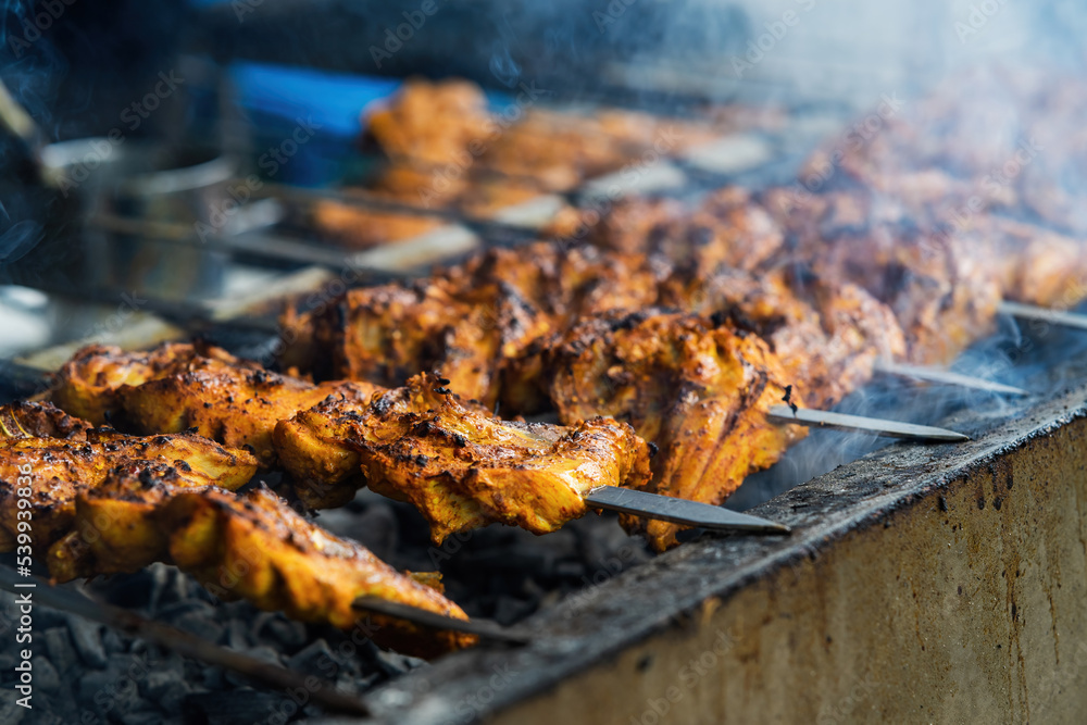 Chicken skew Kebab barbeque. Traditional Indian and Paksitan dish cooked on charcoal and flame.
