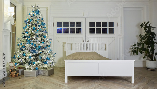 Room decorated for Christmas or new year. The interior of the room with a Christmas tree and decorations