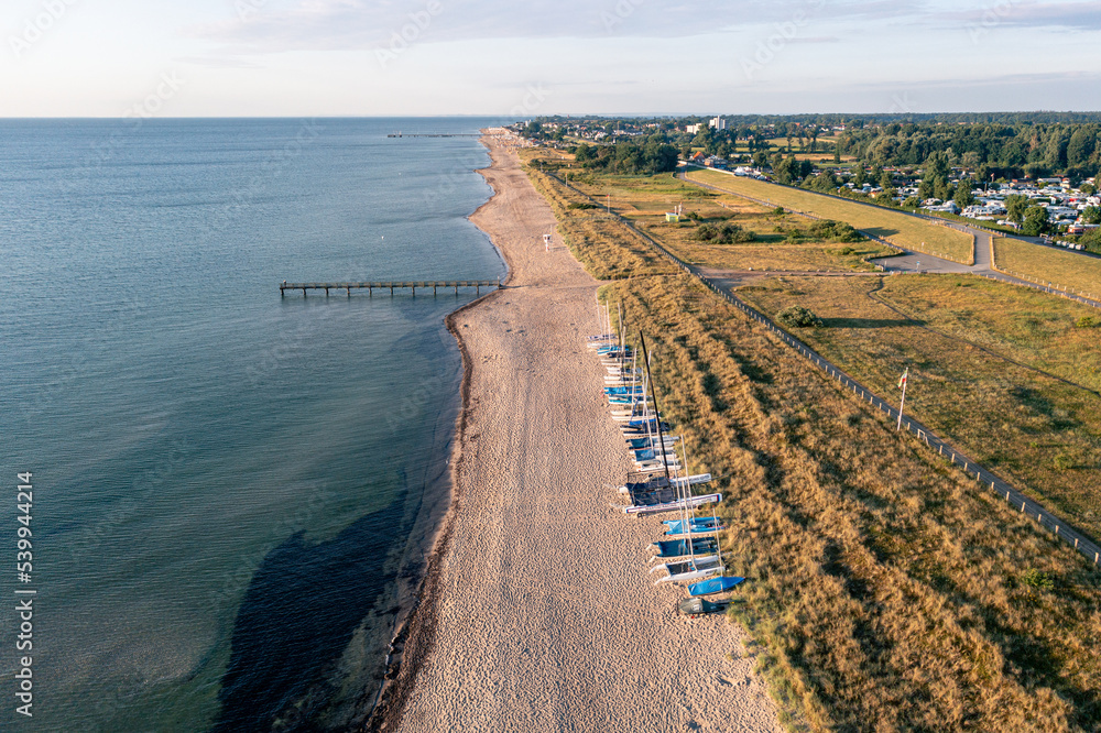 Obraz premium Dahme, Germany - July 31, 2021: Aerial drone view of Dahme Beach in Schleswig-Holstein.