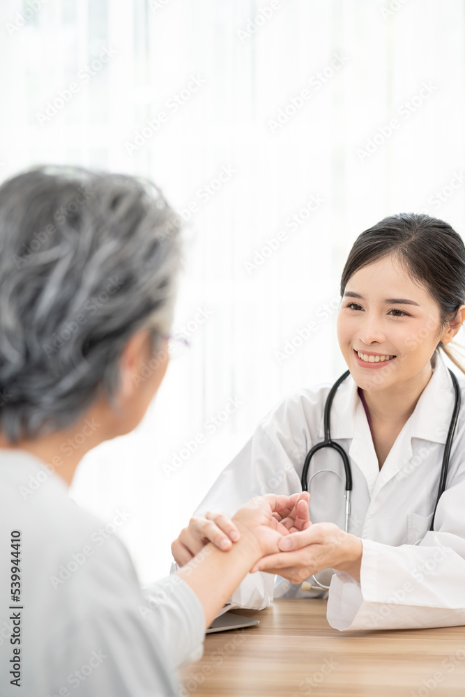 Female doctor using hand to checking the pulse. Doctor checking patient's pulse. Female doctor using hand to checking the pulse. Doctor checking patient's pulse.