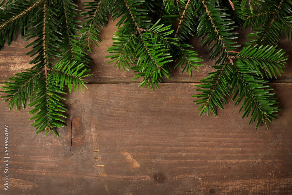 Beautiful fir branches on wooden table. Christmas decoration. Beautiful fir branches on wooden table. Christmas decoration.