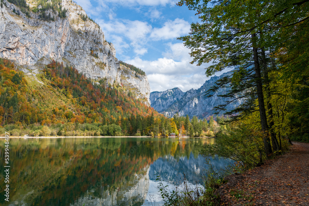 Lake Leopoldstein (Leopoldsteinersee) in the state of styria, austria near the city eisenerz in autumn