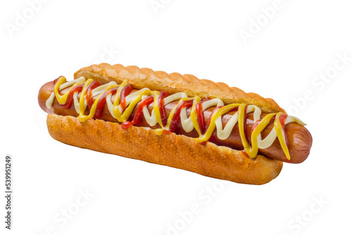 Hot dog garnished with sauces in a white bun