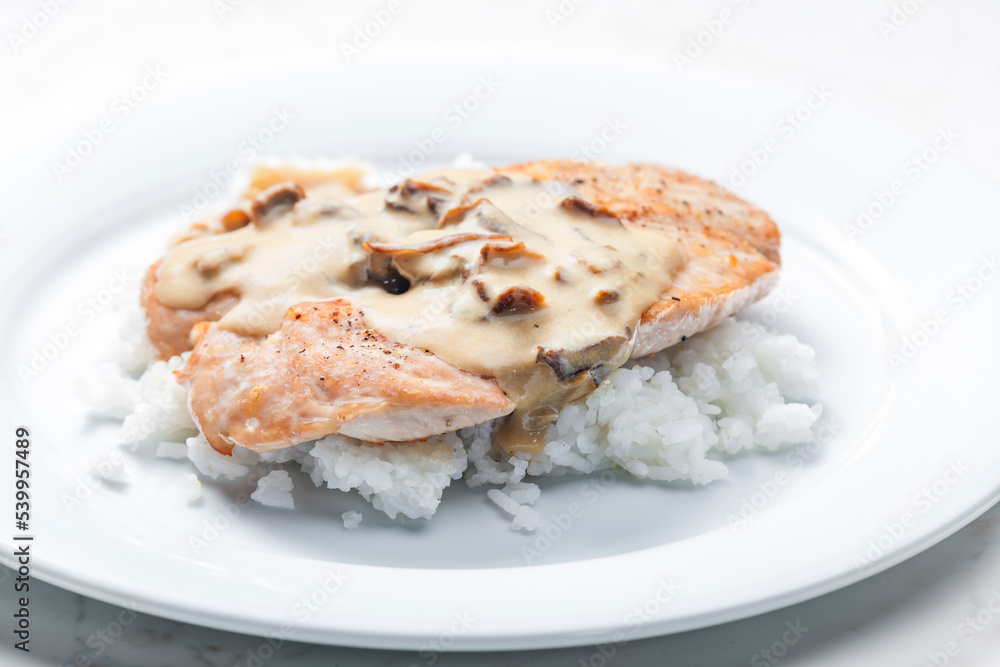 poultry meat with mushroom sauce and rice poultry meat with mushroom sauce and rice