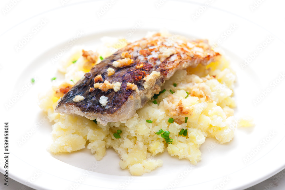 grilled carp with garlic served with mashed potatoes grilled carp with garlic served with mashed potatoes