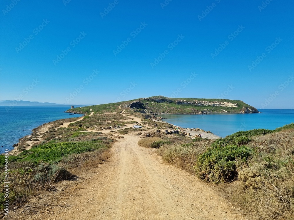 hiking trail to Capo San Marco at sinis peninsula, sardinia, italy hiking trail to Capo San Marco at sinis peninsula, sardinia, italy