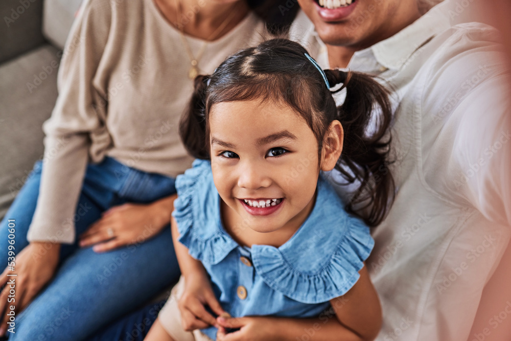 Selfie, family and young happy girl together bonding on living room sofa. Portrait of adorable Asian child happiness smile on face closeup, love and care support or relax spend time in family home Selfie, family and young happy girl together bonding on living room sofa. Portrait of adorable Asian child happiness smile on face closeup, love and care support or relax spend time in family home