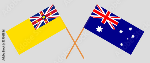 Crossed flags of Niue and Australia. Official colors. Correct proportion