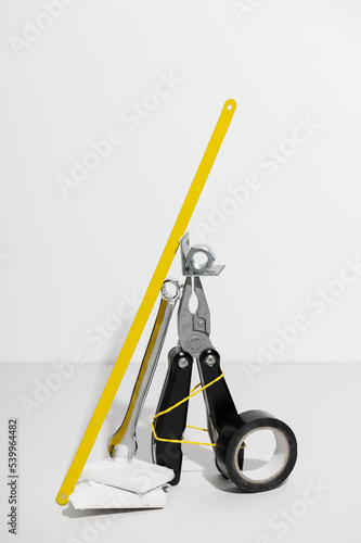 Composition with different repairman manual tools on white background. Instruments kit for various purposes. Improvement supplies (ID: 539964482)
