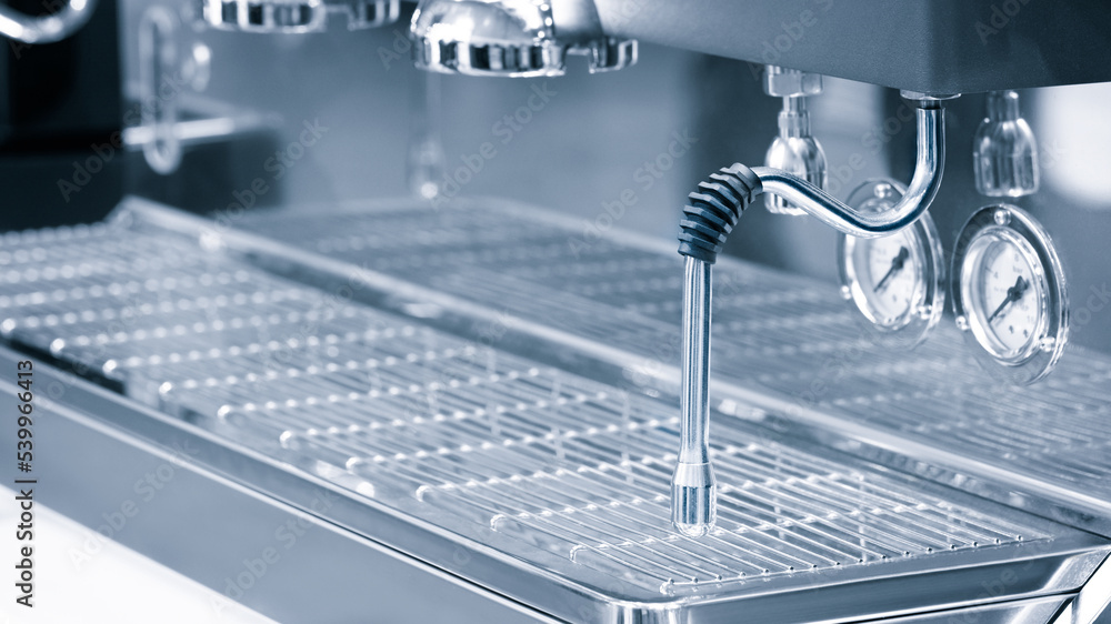 Espresso machine in blue tone as background Espresso machine in blue tone as background