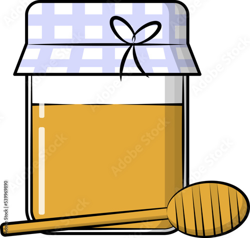 Honey in a glass jar with a honey stick