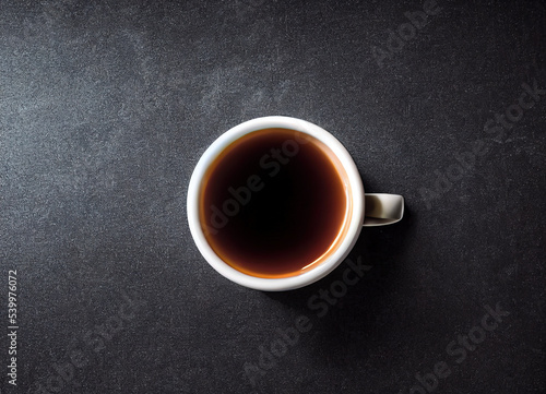 Coffe cup on black table background