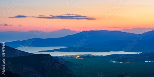 View over the Pleistos River Valley towards the Gulf of Corinth at dusk, Delphi, Phocis photo
