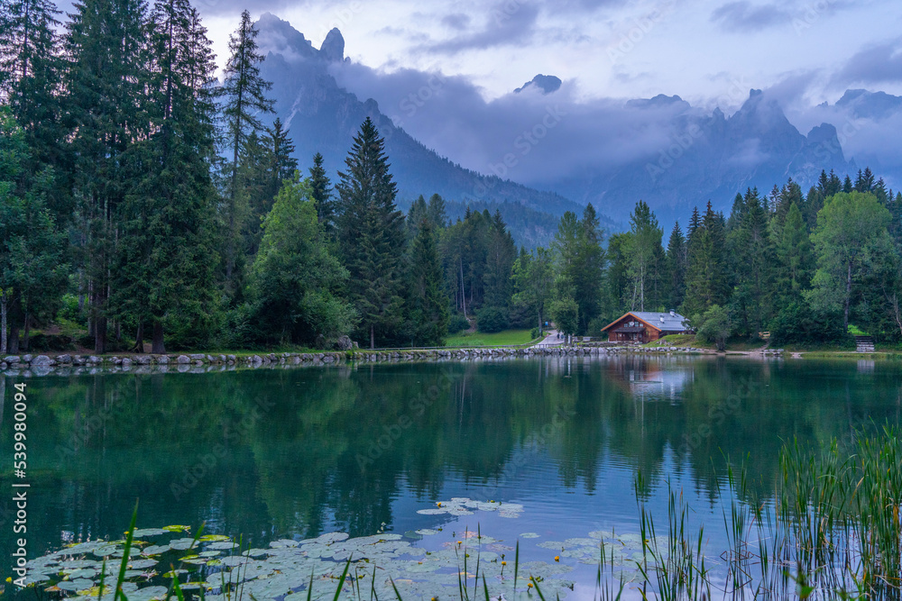 Lake Welsperg at sunset, Canali Valley, Dolomites, Trentino, Italy Lake Welsperg at sunset, Canali Valley, Dolomites, Trentino, Italy