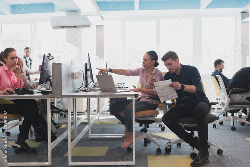 Wallpaper Mural Collaborative process of multicultural skilled young business team during brainstorming meeting in office.Diverse group of young people dressed in formal wear cooperating on developing design project Torontodigital.ca
