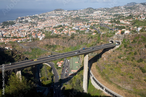 View from Botanical Gardens of VR1 bridge and Western and Northern Funchal, Madeira, Atlantic photo