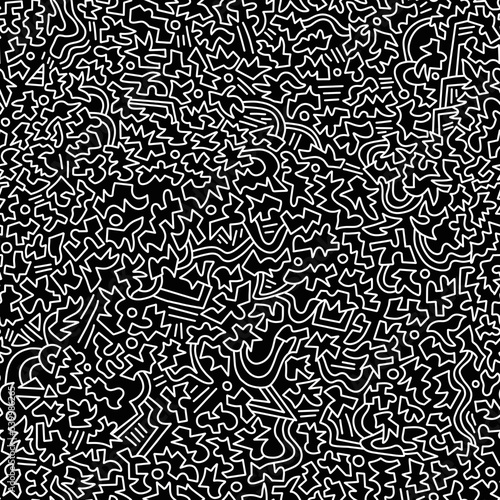 Black and white cartoon pattern on a black background, abstract design, seamless background. 