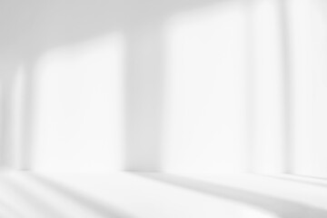 Blurred abstract white studio background for product presentation. Empty room with shadows of window. Display product.