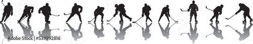 silhouette of people playing hockey photo