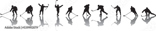 silhouette of people playing hockey