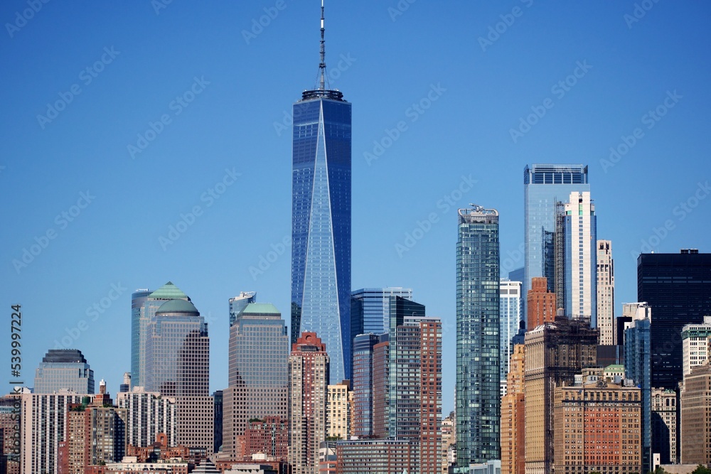View of the skyscrapers of New York's financial district in broad daylight on a radiant day without any clouds.