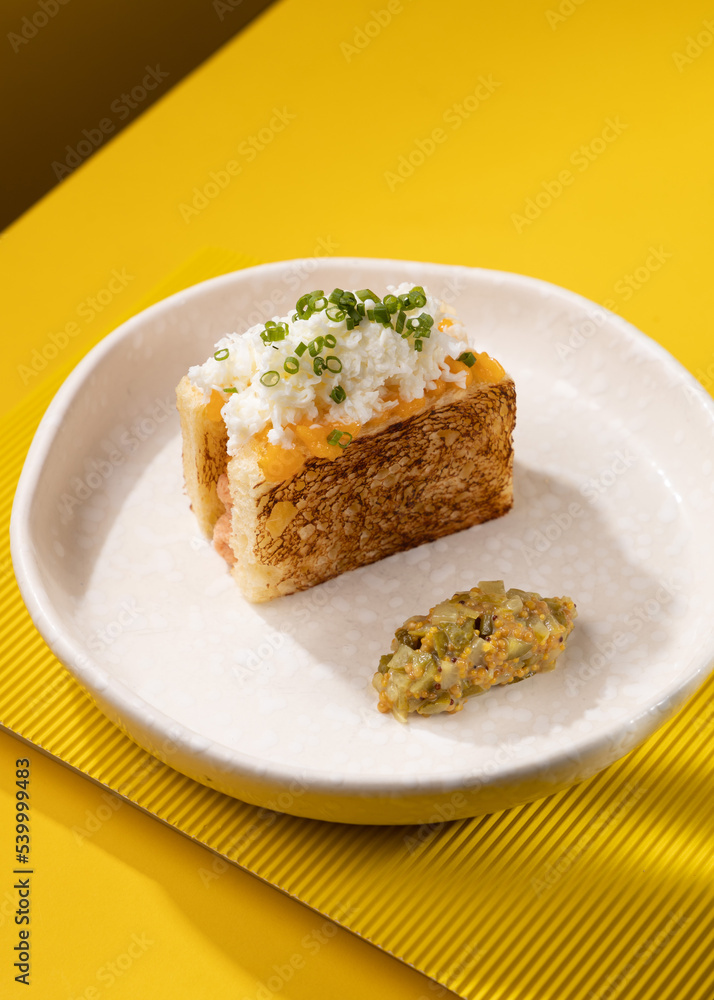 casserole with vegetables on a yellow background casserole with vegetables on a yellow background