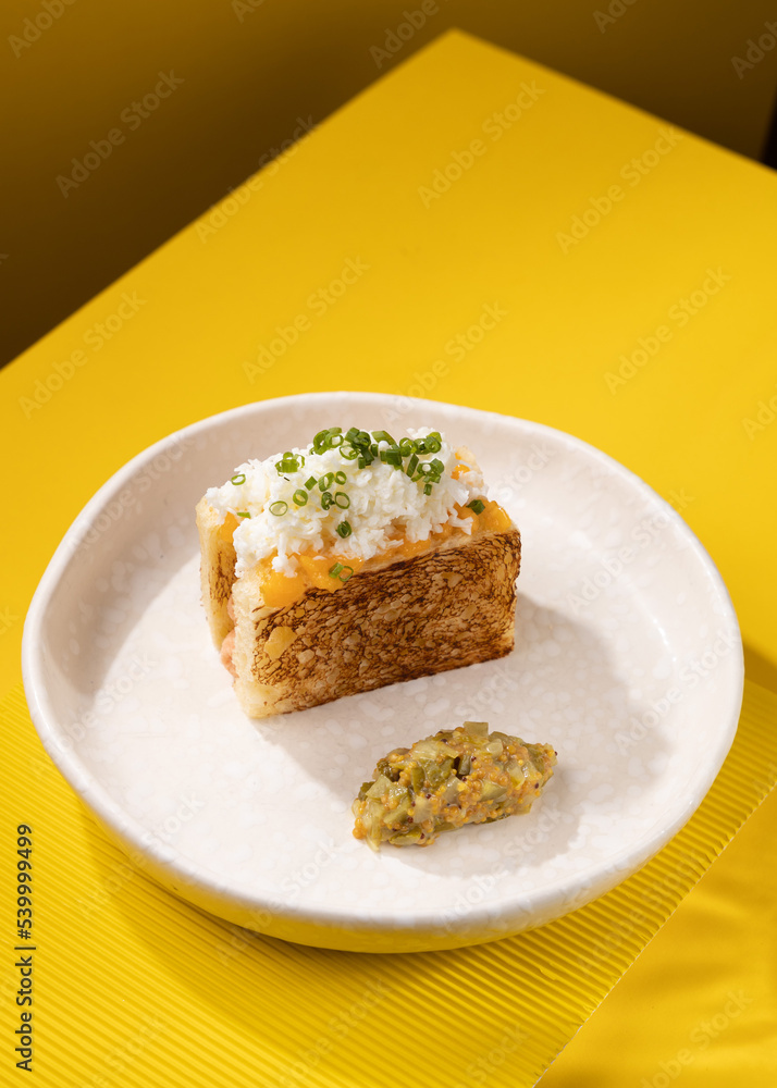 casserole with vegetables on a yellow background casserole with vegetables on a yellow background