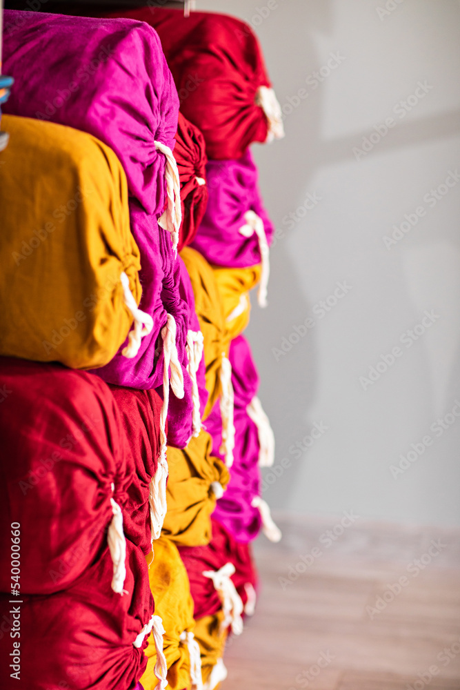 A bolster on a shelf in the gym closet. A special yoga roller. A bolster on a shelf in the gym closet. A special yoga roller.