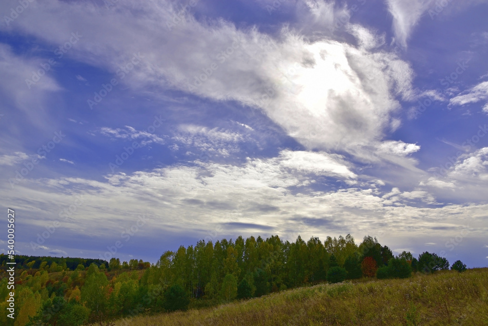 Autumn sky with light clouds