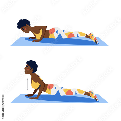 Push up off the floor, cobra push-up, young female athlete doing fitness exercise, fitness at home.