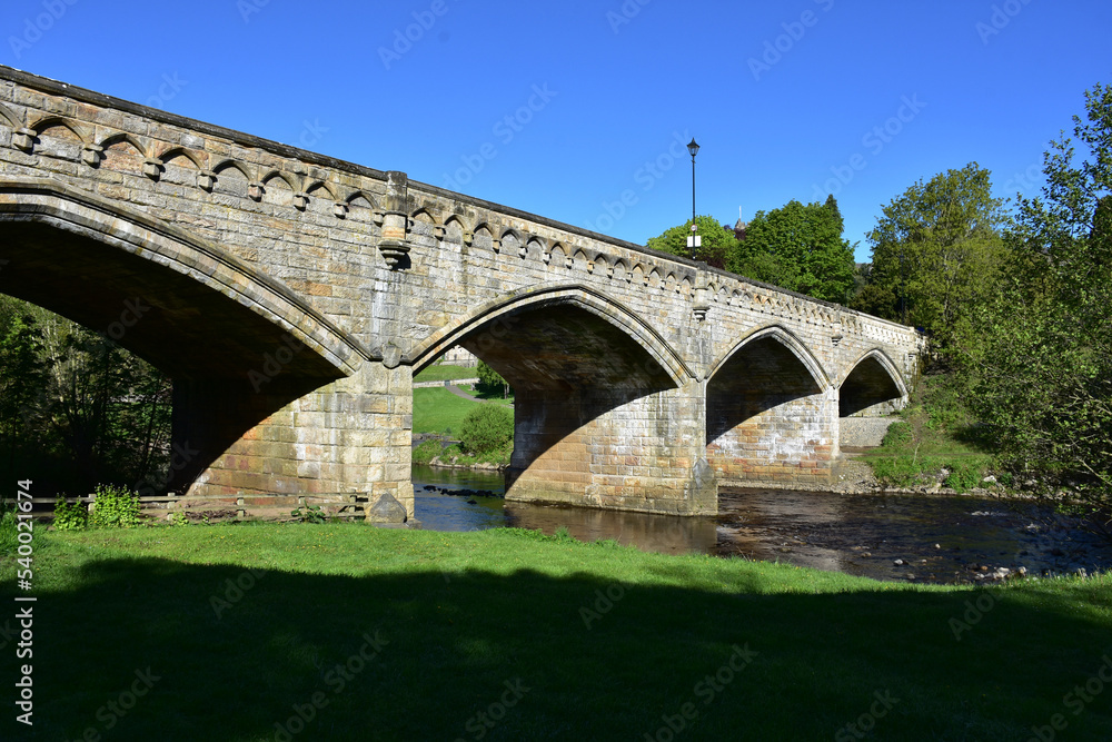 Beautiful Old Stone Archway Bridge Over a River