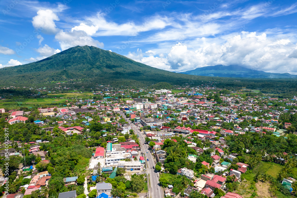Aerial of Mount Iriga and Iriga City in the Bicol Region of the Philippines. Mount Malinao visible in the right of the photo.