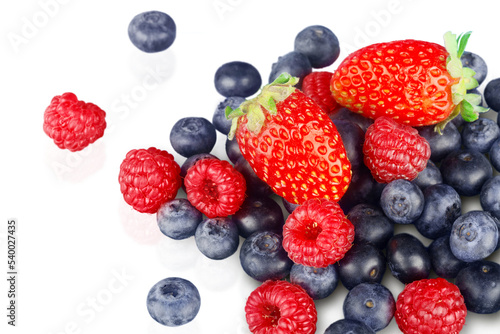 Fresh ripe berries on white background