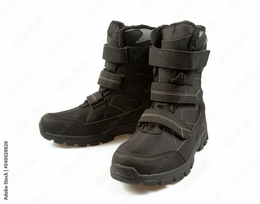 Pair of brown hiking boots isolated isolated on a white background Pair of brown hiking boots isolated isolated on a white background