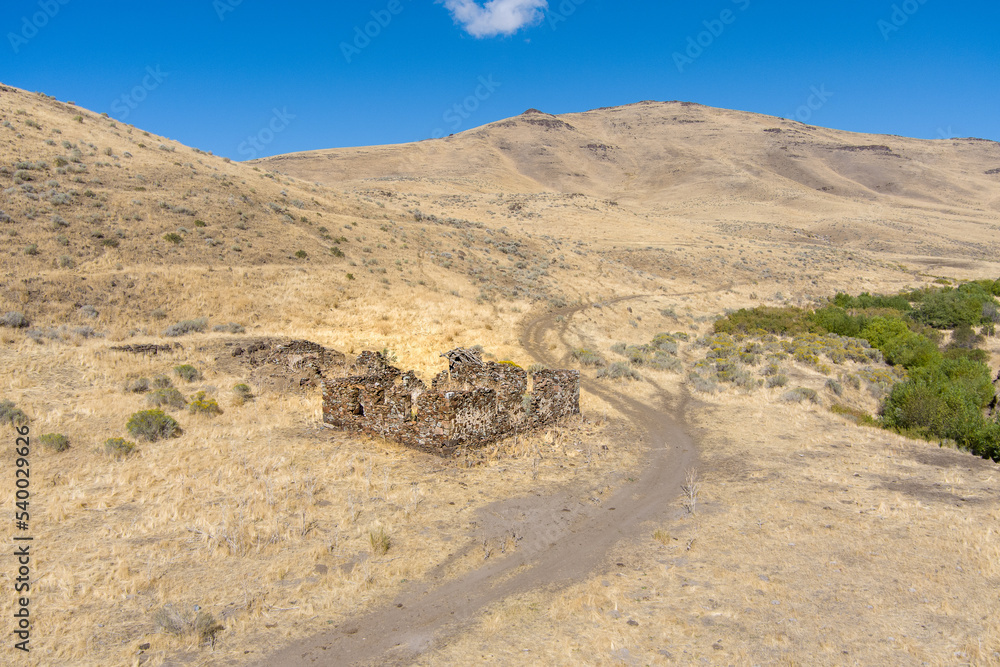 Aerial view of an abandoned building ruins made from rocks in the ...