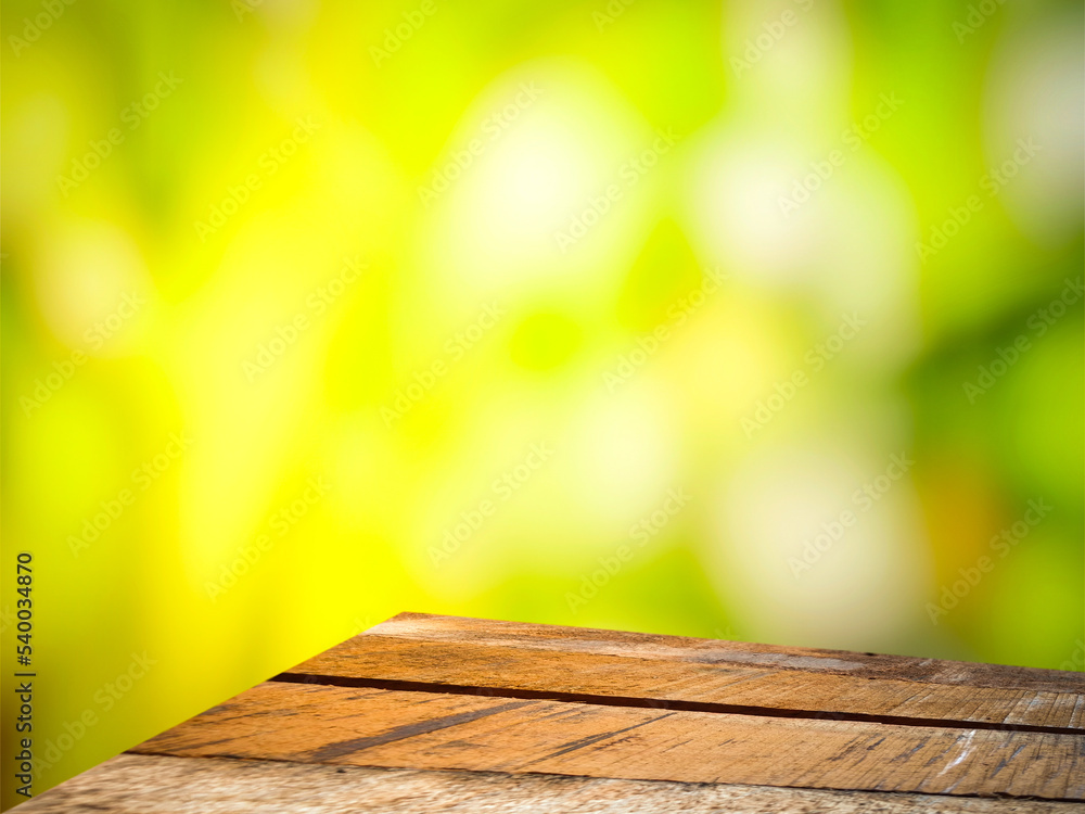 brown wooden table green forest blur background brown wooden table green forest blur background