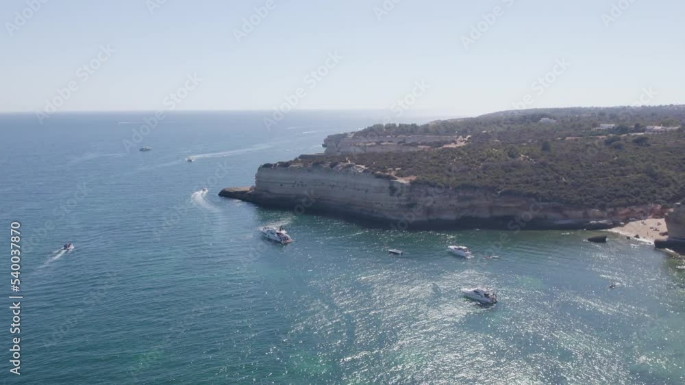 Aerial Algarve Seascape and Coastline Cliffs, a Worldwide Popular Beach and Nature Destination Region, in South Portugal. Aerial Algarve Seascape and Coastline Cliffs, a Worldwide Popular Beach and Nature Destination Region, in South Portugal.