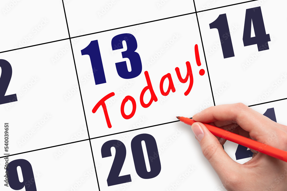 13th day of the month. Hand writing text TODAY on calendar date. Save the  date. A reminder of the last day. Deadline. Business concept Day of the  year concept. Stock Photo