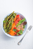 Buckwheat healthy vedan dinner, lunch.  Salad or Buddha bowl  for championship with buckwheat , green beans, tomatoes, onions, herbs and spices. Simple and economical recipe full of vegan proteins