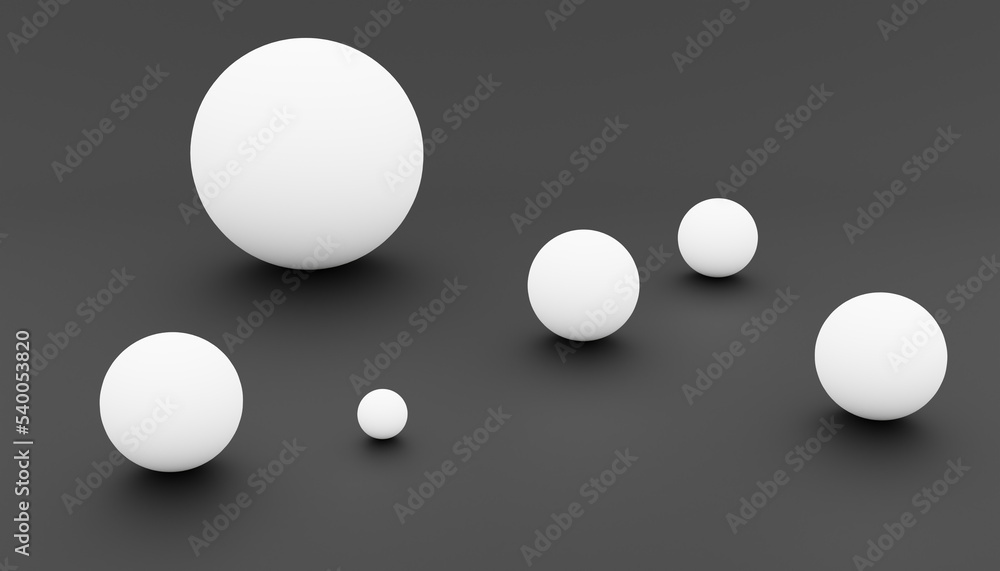 3d-rendering of some white balls with different sizes in front of a black background 3d-rendering of some white balls with different sizes in front of a black background